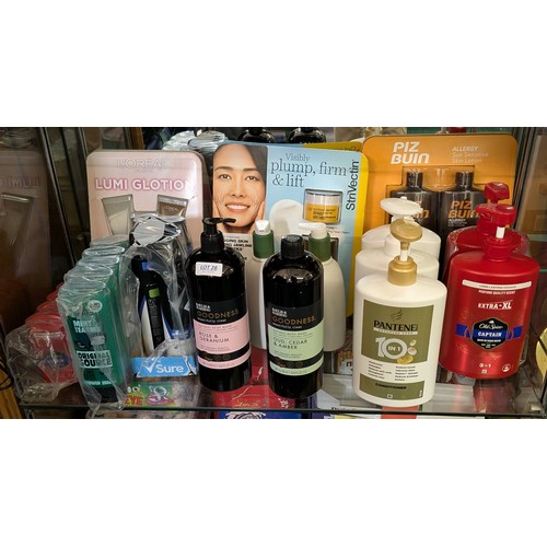 28 - SHELF OF VARIOUS TOILETRIES INCL PIZ BUIN SKIN LOTION, PANTENE SHAMPOO, AND CONDITIONER, SURE BODY S... 