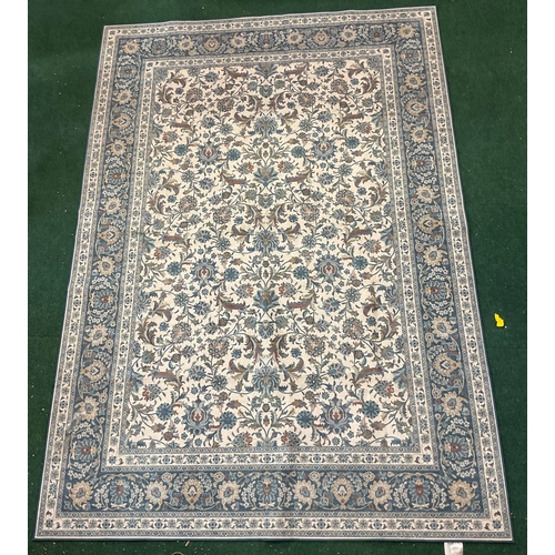 67 - WYATT AND ASH BLUE FLOWER PATTERNED RUG - APPROX 160.CM X 225.CM