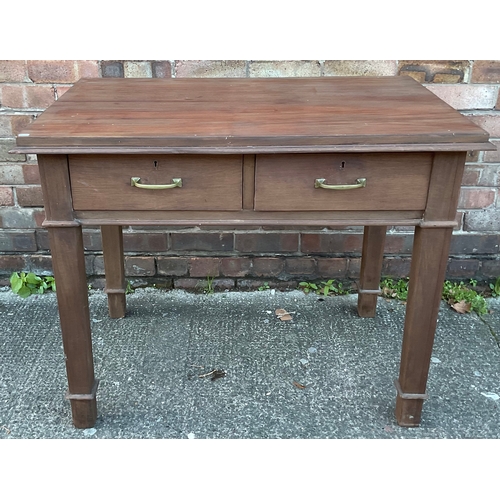310 - AN ANTIQUE GEORGIAN STRIPPED MAHOGANY DESK ON SQUARE LEGS, WITH TWO DRAWERS TO UNDERSIDE FITTED WITH... 