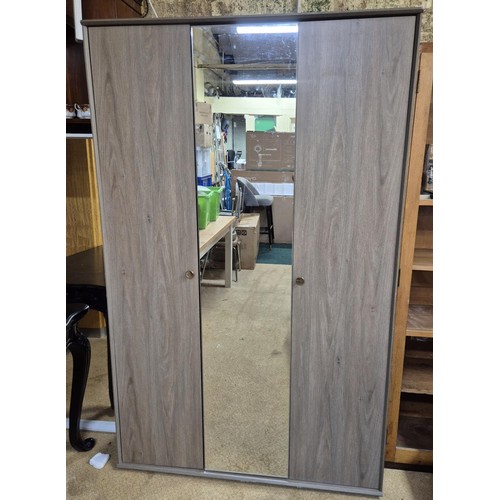 340 - A MODERN WOODEN GREY WARDROBE, CENTRAL MIRROR FLANKED BY TWO DOORS, WITH FITTED SHELVES TO INTERIOR ... 