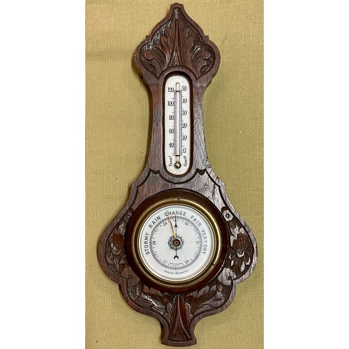 330 - AN EDWARDIAN OAK BAROMETER