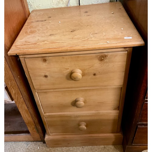 327 - A VINTAGE STRIPPED PINE THREE DRAWER BEDSIDE CHEST - APPROX 76.CM.H X 49.CM.W X 42.CM.D