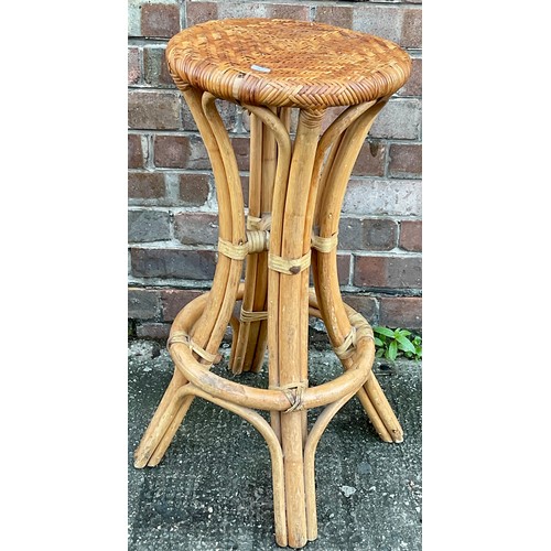 323 - AN UNUSUAL CANE TALL PLANT STAND - APPROX 74.CM.H X 35.CM.W X 35.CM.D