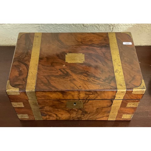 308 - A VICTORIAN WALNUT BANDED WRITING SLOPE, WITH RED LEATHER FITTED INTERIOR AND BRASS INLAY TO EXTERIO... 