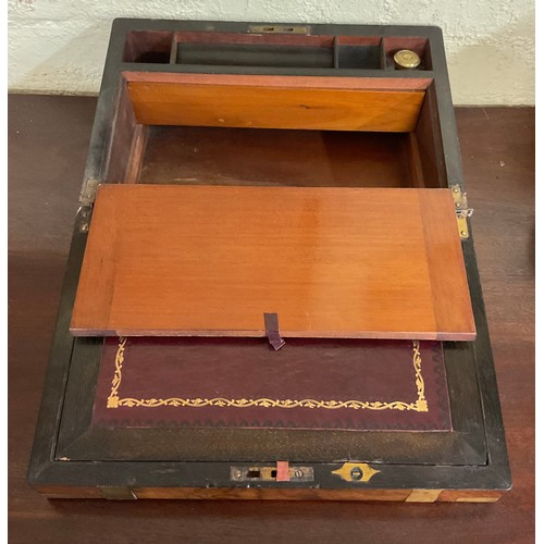308 - A VICTORIAN WALNUT BANDED WRITING SLOPE, WITH RED LEATHER FITTED INTERIOR AND BRASS INLAY TO EXTERIO... 