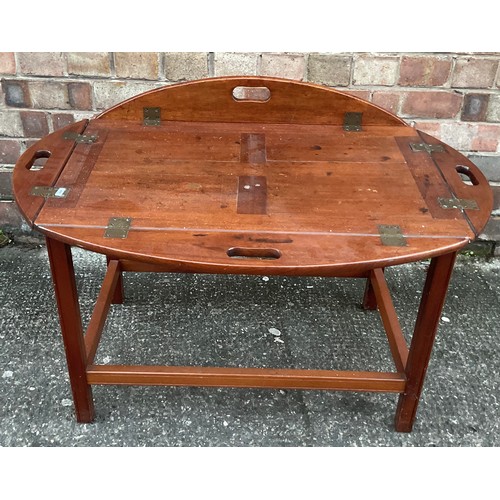 315 - AN ANTIQUE VICTORIAN MAHOGANY BUTLERS TRAY, WITH OVAL DROP FLAPS EACH WITH CARVED CARRY HANDLES TO C... 