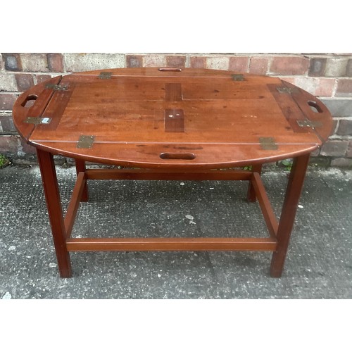 315 - AN ANTIQUE VICTORIAN MAHOGANY BUTLERS TRAY, WITH OVAL DROP FLAPS EACH WITH CARVED CARRY HANDLES TO C... 