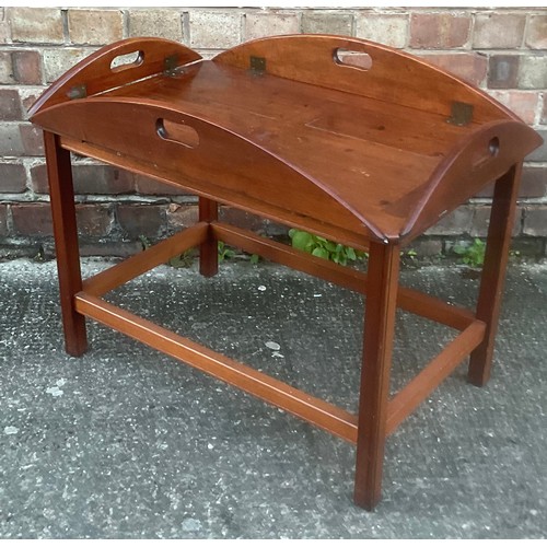 315 - AN ANTIQUE VICTORIAN MAHOGANY BUTLERS TRAY, WITH OVAL DROP FLAPS EACH WITH CARVED CARRY HANDLES TO C... 
