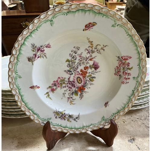 430 - A COLLECTION OF 18 KPM BERLIN “KONIGSGLATT” PORCELAIN PLATES WITH FLORAL BOUQUETS SCATTERED FLOWERS ... 