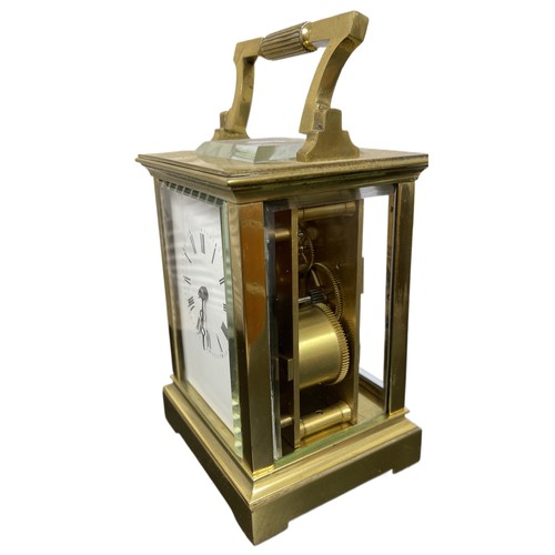 452 - AN ANTIQUE BRASS AND GLASS CARRIAGE CLOCK, WITH STRIKING MOVEMENT, MARKED TO MECHANISM, 'HAND' & '46... 