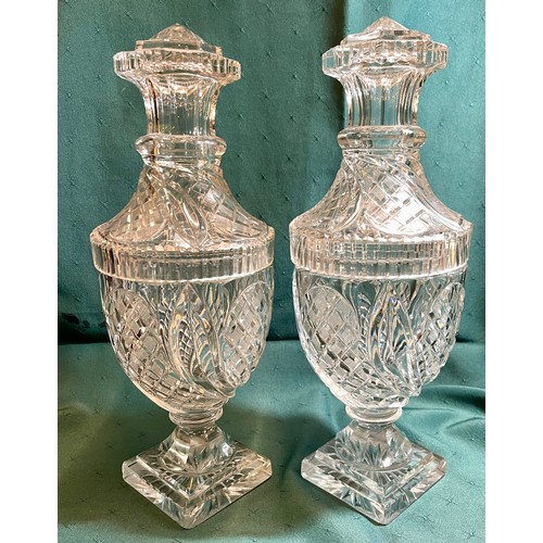 464 - A PAIR OF EARLY 19TH.C CUT GLASS CRYSTAL BONBON DISHES RAISED ON A STEPPED SQUARE FOOT, THE COVER WI... 