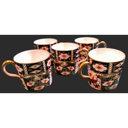 469 - A SET OF X6 ROYAL CROWN DERBY COFFEE CANS AND X5 SAUCERS TO MATCH, IN TRADTIONAL IMARI PATTERN MARKE... 