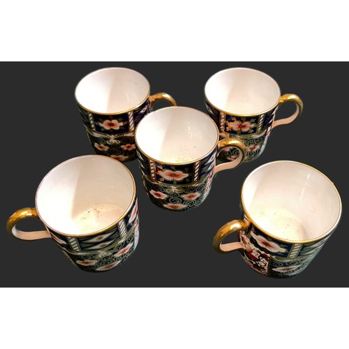 469 - A SET OF X6 ROYAL CROWN DERBY COFFEE CANS AND X5 SAUCERS TO MATCH, IN TRADTIONAL IMARI PATTERN MARKE... 