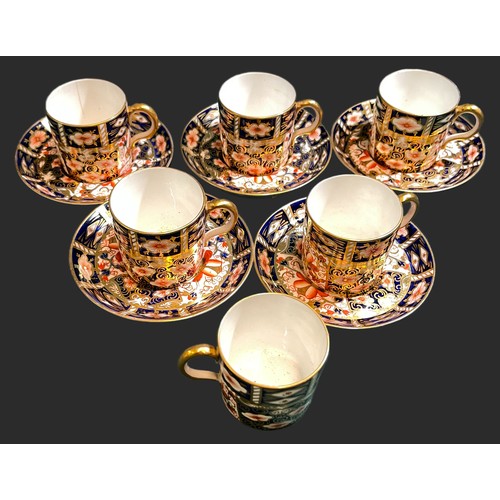 469 - A SET OF X6 ROYAL CROWN DERBY COFFEE CANS AND X5 SAUCERS TO MATCH, IN TRADTIONAL IMARI PATTERN MARKE... 