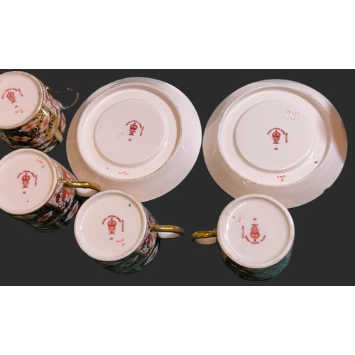 469 - A SET OF X6 ROYAL CROWN DERBY COFFEE CANS AND X5 SAUCERS TO MATCH, IN TRADTIONAL IMARI PATTERN MARKE... 