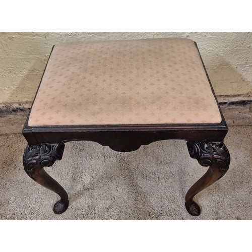 321 - VICTORIAN MAHOGANY FOOT STOOL, WITH PINK PATTERNED UPHOLSTERED CUSHION ON CARVED PAW FEET WITH FEATH... 