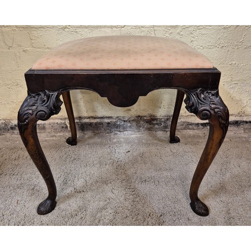 321 - VICTORIAN MAHOGANY FOOT STOOL, WITH PINK PATTERNED UPHOLSTERED CUSHION ON CARVED PAW FEET WITH FEATH... 