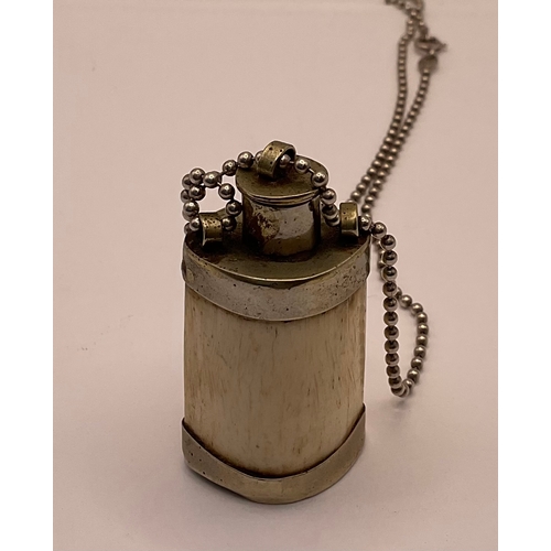 351A - A CHINESE WHITE METAL AND BONE SNUFF BOTTLE, ON AN ENGLISH SILVER CHAIN HALLMARKED 925