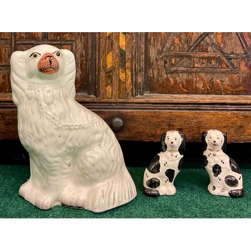 450 - 3X ANTIQUE STAFORDSHIRE DOG FIGURINES TALLEST IN WHITW WITH PINK MOUTH AND 2 OTHERS IN BLACK AND WHI... 