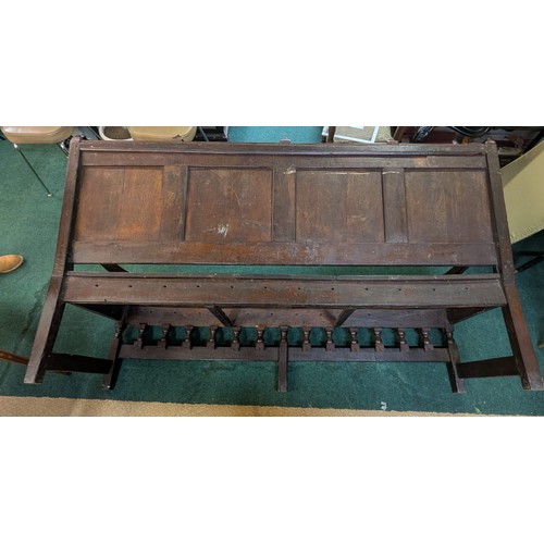 283 - AN ANTIQUE OAK VICTORIAN CARVED BENCH, IN THE JACOBEAN REVIVAL STYLE, HIGH PANELLED BACK WITH HEAVIL... 