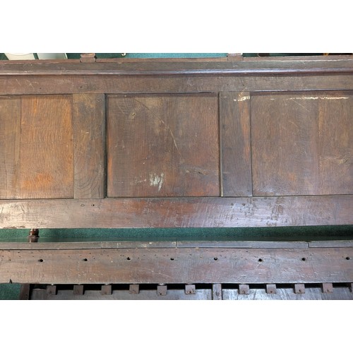 283 - AN ANTIQUE OAK VICTORIAN CARVED BENCH, IN THE JACOBEAN REVIVAL STYLE, HIGH PANELLED BACK WITH HEAVIL... 