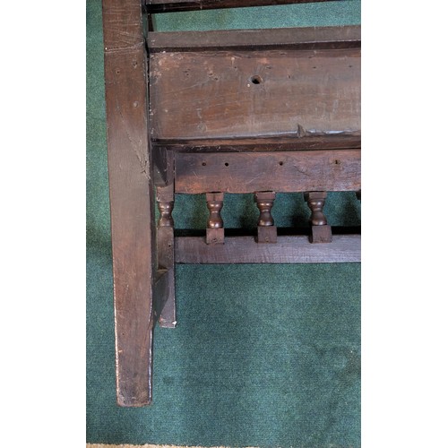 283 - AN ANTIQUE OAK VICTORIAN CARVED BENCH, IN THE JACOBEAN REVIVAL STYLE, HIGH PANELLED BACK WITH HEAVIL... 