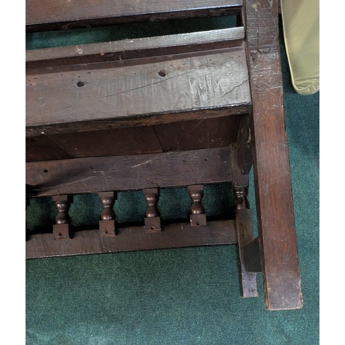 283 - AN ANTIQUE OAK VICTORIAN CARVED BENCH, IN THE JACOBEAN REVIVAL STYLE, HIGH PANELLED BACK WITH HEAVIL... 