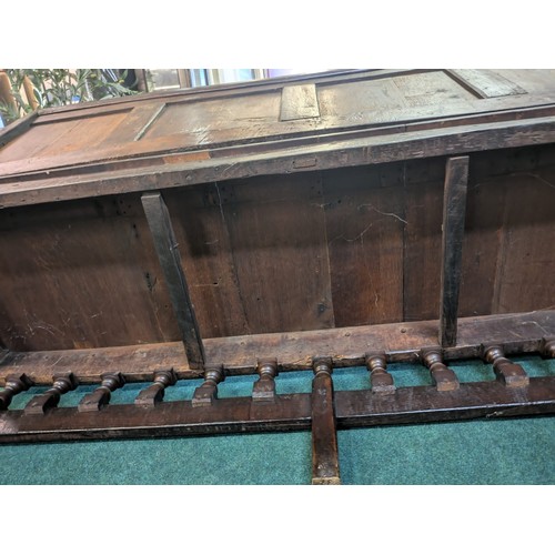 283 - AN ANTIQUE OAK VICTORIAN CARVED BENCH, IN THE JACOBEAN REVIVAL STYLE, HIGH PANELLED BACK WITH HEAVIL... 