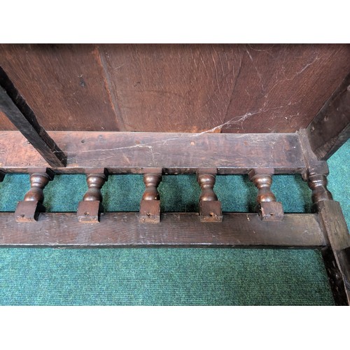 283 - AN ANTIQUE OAK VICTORIAN CARVED BENCH, IN THE JACOBEAN REVIVAL STYLE, HIGH PANELLED BACK WITH HEAVIL... 