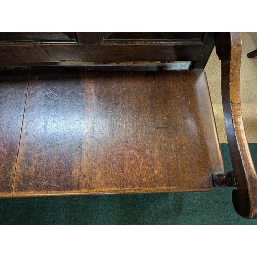 283 - AN ANTIQUE OAK VICTORIAN CARVED BENCH, IN THE JACOBEAN REVIVAL STYLE, HIGH PANELLED BACK WITH HEAVIL... 