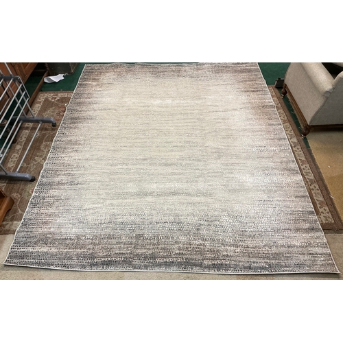 40 - CALVIN KLEIN ‘RADIUS’ SILVER GREY AREA RUG 238cm x 299cm