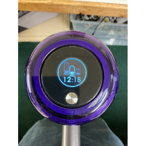 98 - BOXED DYSON V11 STICK VACUUM CLEANER WITH WALL MOUNTED CHARGER, 2 HEADS AND 4 ACCESSORIES