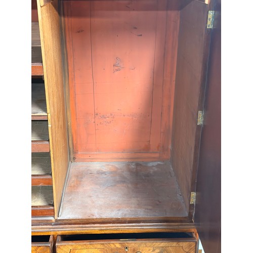 238 - A GEORGIAN MAHOGANY LINEN PRESS, A MOULDED CORNICE OVER TWO PANELLED DOORS OPENING TO SHELVED AND DR... 