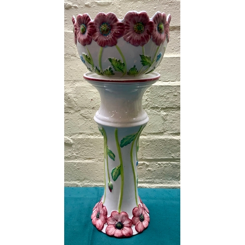 291 - A WHITE CERAMIC JARDINIERE DECORATED WITH FLOWERS 53CM H