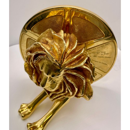 296 - AN ARTHUS-BERTRAND HEAVY GILT BRONZE CANNES LIONS TROPHY AWARD FOR 2007, 16CM DIAMETER