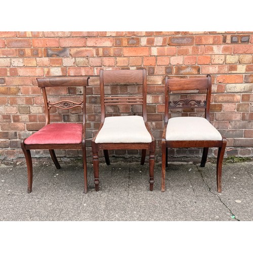 271 - X3 EARLY VICTORIAN MAHOGANY UPHOLSTERED CHAIRS, CARVED BACK SPLATS TO EACH, ALL WITH SABRE LEGS