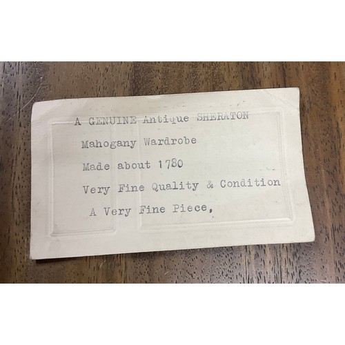 238 - A GEORGIAN MAHOGANY LINEN PRESS, A MOULDED CORNICE OVER TWO PANELLED DOORS OPENING TO SHELVED AND DR... 