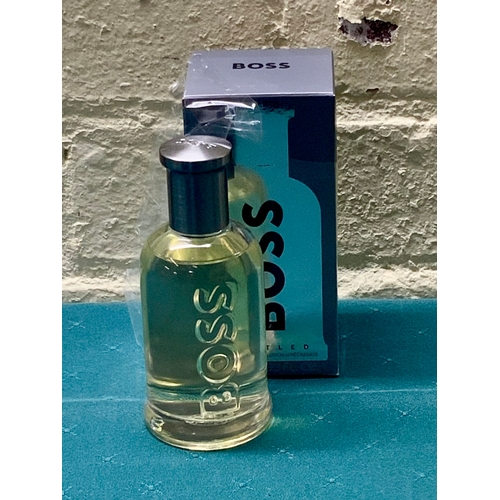 24 - BOXED BOSS BOTTLED AFTERSHAVE LOTION 100ML