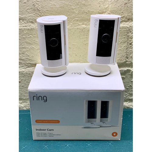 28 - BOXED SET OF 2 RING 1080P HD VIDEO INDOOR CAMERAS WITH COLOUR NIGHT VISION, TWO WAY TALK, POWER CABL... 