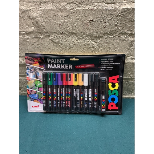 35 - A PACKAGED 12 PACK OF POSCA PAINT PENS