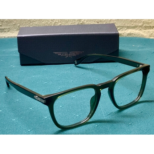 50 - PAIR OF POLICE SPECTACLE FRAMES IN DARK GREEN WITH CASE - “GRIND 1” SPLR74