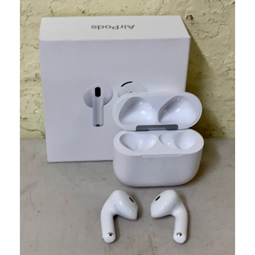 14 - BOXED APPLE AIRPODS 4TH GEN IN WIRLESS CHARGING CASE