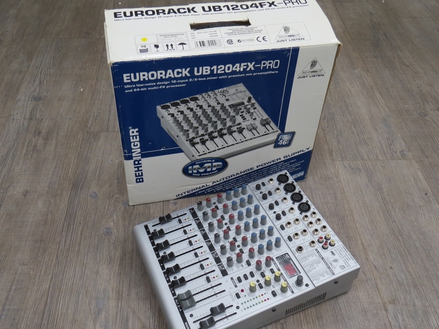 A Behringer Eurorack UB1204FX Pro four channel mixer, boxed