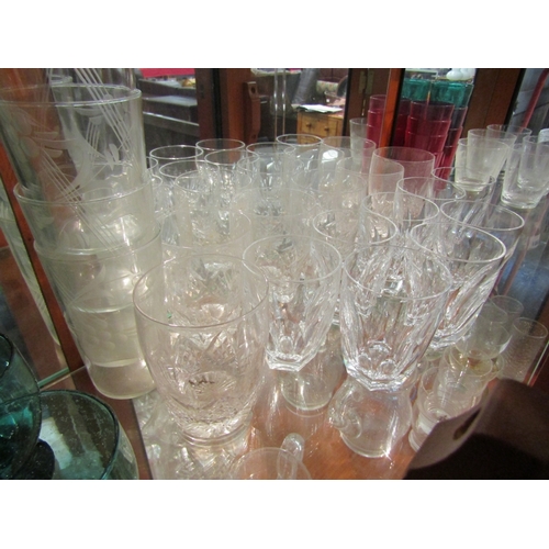 1007 - A collection of cut glass tumblers including Waterford crystal