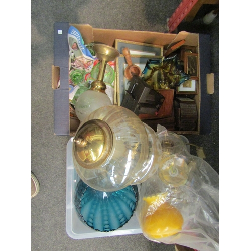 1065 - Two boxes of assorted items including oil lamp style lamps, glassware, pictures, clock etc.