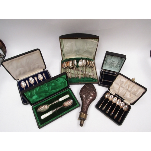 1439 - A collection of cased cutlery sets including silver and plated examples, together with an ornate cop... 