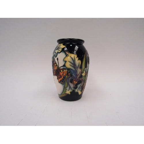 1445 - A Moorcroft Avalon pattern vase by Sian Leeper, 10.5cm tall, boxed