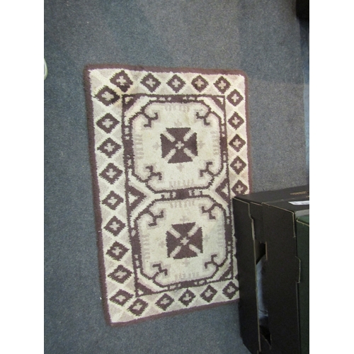 1651 - A small woollen rug with matching runner.    (R) £10