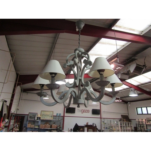 1654 - A six arm modern ceiling light with shades