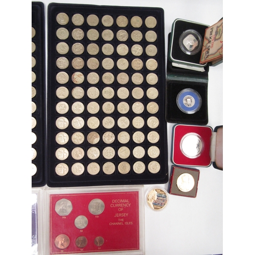 1440 - A box of assorted coins to include cased Jersey pre-decimal coin sets, silver proof £1 and two trays... 